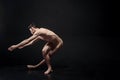 Artistic ballet dancer performing in the studio