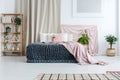 Artistic bedroom with pastel cloths Royalty Free Stock Photo