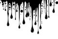 Artistic black ink drips creating a dynamic abstract pattern. Royalty Free Stock Photo