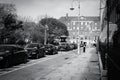 Artistic black-and-white shot of a row of parked cars on a city sidewalk, Dublin Royalty Free Stock Photo