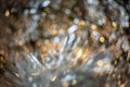 Artistic bokeh. Blurry gray background. Toned image does not focus.