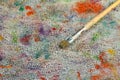 Artistic brushes close up. Watercolor paints in the background. Background with brushes and paints. Royalty Free Stock Photo