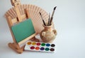 Artistic brushes and easel Royalty Free Stock Photo