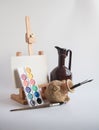 Artistic brushes and easel Royalty Free Stock Photo