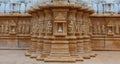 Artistic carving on red and white stone, shankheshwar parshwanath, jain temple, gujrat, India Royalty Free Stock Photo