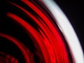 Artistic close-up of an illuminated red wine glass Royalty Free Stock Photo