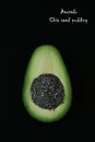 Artistic composition of Avocado end Chia seed on black background. Vegetarian food. Healthy food. Royalty Free Stock Photo