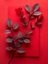 Artistic Composition of Dark Red Leaves Against a Bold Red Background