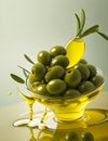 Olives and olive oil and olive leaves floating on a green background Royalty Free Stock Photo