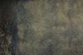 Artistic dark gray background old flat porous shabby scratched concrete plaster on an ancient wall in the gloom for a creative