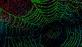 Green digital spider web in colorful binary code on black background Royalty Free Stock Photo