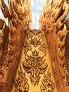 Artistic details close up of Golden sculpture or Statue of white Buddha in Wat Rong Khun Chiang Rai