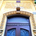 Artistic door, urban design, architecture and Liberty style in Turin city, Italy