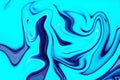 an artistic fusion of liquid beauty, colorful forms, and fluid expression in an immersive journey through blue and white paint