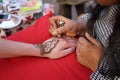 Henna painting design on hand Royalty Free Stock Photo