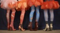 Four women\'s legs wearing bright pantihose, boots and tutus Royalty Free Stock Photo