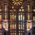 an artistic and interesting image inside a building, with stained windows
