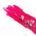 Artistic lipstick smudge and eyeshadow close-up isolated on white background Royalty Free Stock Photo