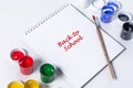 Artistic mock-up on white background with text back to school. Drawing tools: colored acrylic paint, paintbrush, and Royalty Free Stock Photo