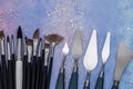 Artistic palette knives and drawing brushes, creative tools of various sizes and shapes Royalty Free Stock Photo