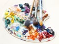 Artistic pallette with oils and paint brushes Royalty Free Stock Photo