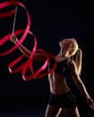 Artistic photo of female dancer with ribbon