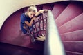 Artistic portrait of elegant woman on stairs