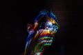 Artistic portrait made with fiber optics. Light painting photography. Day of light