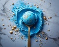 Artistic Presentation of Blue Ice Cream Scoop on Marble Backdrop with Gold Accents