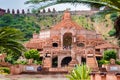 artistic red stone jain temple at morning from unique angle