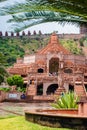 artistic red stone jain temple at morning from unique angle