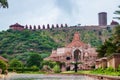 artistic red stone jain temple at morning from unique angle