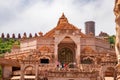 artistic red stone jain temple at morning from unique angle