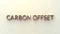Artistic representation of carbon offset concept with modern typography displayed