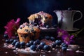 artistic shot of blueberries and muffin crumbs