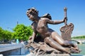 Artistic statue on Alexandre Bridge against Eiffel Tower. Paris, France