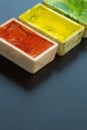 Artistic still life, watercolor pigments in jars