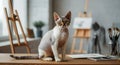 Artistic studio scene with devon rex cat in modern workspace Royalty Free Stock Photo