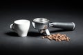 Artistic studio shot of holder for coffee machine, white cup and Royalty Free Stock Photo