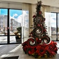 Artistic swirls applied multiple times to a Christmas tree to merge ornaments and flowers