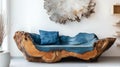 Artistic Tree Trunk Sofa With Cushion And Rustic Wall Decor Royalty Free Stock Photo