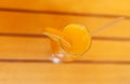 Artistic upper view of orange juice cocktail with straw, shallow Royalty Free Stock Photo