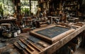 Artistic Vintage Workshop with Tools and Bottles in Soft Light Royalty Free Stock Photo