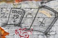 Artistic walls with COVID-19 gravestone cemetery paintings graffiti Mexico
