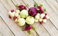 Artistically arranged flowers and vegetables for displaying healthy organic foods