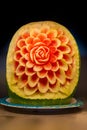 Artistically carved watermelon in shape of a flower Royalty Free Stock Photo