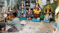 Artists working on idols of the Hindi Goddess Durga in his workshop on the streets of