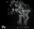 Artitic black and white view of burning incense cones with intense smoke Royalty Free Stock Photo