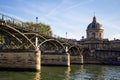 Arts Bridge Pont des Arts with the Institute of France in Paris, France