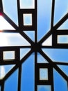 Arts and crafts geometric skylight window with clear blue sky Royalty Free Stock Photo